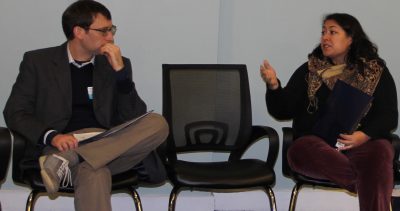 Emmeline Harrigan, right, assistant town planner for Fairfield, discusses issues raised about shoreline property and permitting boundaries by presenter Read Porter, left.
