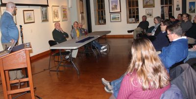 Jason Vincent, left, Stonington's director of planning, moderated a question-and-answer session about shellfish aquaculture at the La Grua Center on Jan. 29. Panelists Don Murphy, second from left, chairman of the town's Shellfish Commission, Tessa Getchis, center, of Connecticut Sea Grant, and Steve Plant, right, of Connecticut Cultured Oysters, answered audience questions.