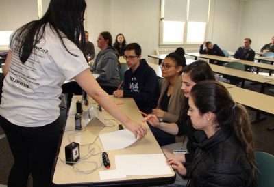 The Glastonbury High team prepares for the short-answer portion of the contest.