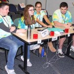 Members of one of two teams from the Science and Technology Magnet High School of Southeastern Connecticut take a break before the next round of questions.