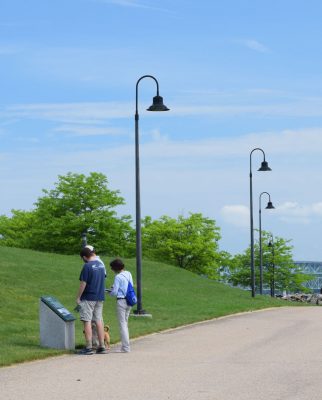 A family finds clues on the path at Fort Trumbull.