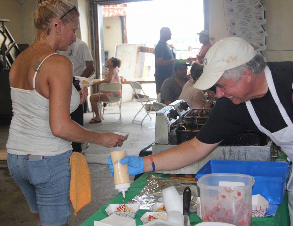 Fish tacos made with yellowtail flounder and whiting and topped with pico de gallo sauce was a popular offering at the Stonington Town Dock Open House on July 28.
