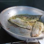 The scup fillets were sautéed in a pesto sauce.
