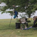 Patty Scott of Rowayton sketched a shoreline scene from under a tree in front of the Branford House.