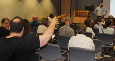 Read Porter, top right, senior staff attorney at the Marine Affairs Institute, hears a question from UConn postdoctoral research associate Grant McCardell.