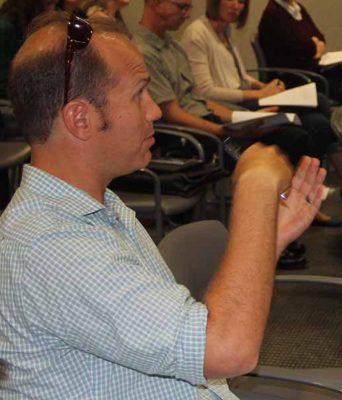 Tim Pusack, assistant professor in the Maritime Studies Program of Williams College and Mystic Seaport, asks a question during the forum.