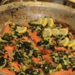 Salmon topped with kelp, leeks and grilled lemon was one of the dishes prepared by Trombetta.