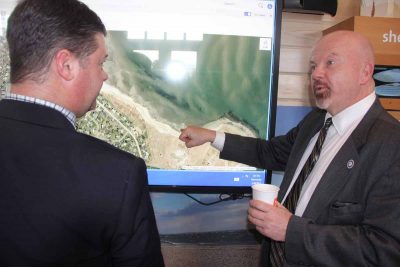 Kevin O'Brien of DEEP, who led the data and mapping work team for the Blue Plan, talks about the map of the Stratford area with state Rep. Joseph Gresko.