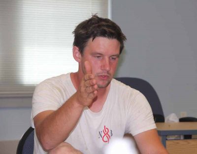 Shellfish farmer Tim Londregan makes a point during the discussion.