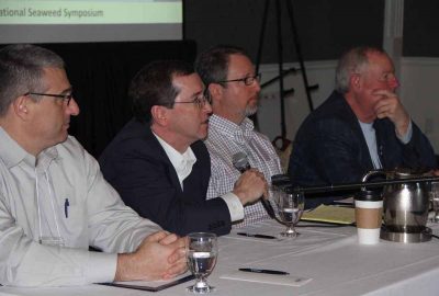Steven Bloodgood of the Food and Drug Administration, second from left, answers a question during the federal regulators panel presentation.