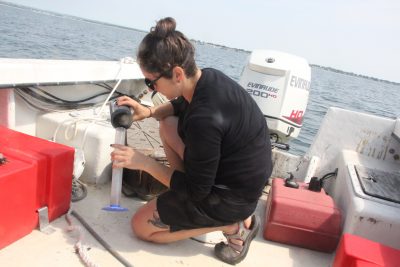 Russo carefully preserves each sample after collection.
