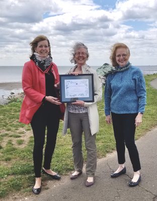 Judy Preston, center, and leaders of the Fairfield Garden Club stand at a site overlooking Long Island Sound after receiving the Garden Club of America Zone Conservation Commendation Award at a ceremony on April 30.