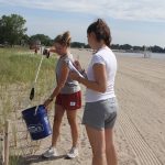 Emma Ofer, left, and Alex Ofer volunteered for the cleanup after they saw it advertised on Facebook.