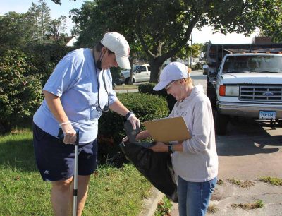 Betsy Perkins, left, and Nancy Dolan, both of New London have been doing the cleanup at Ocean Beach for the past several years. "We love doing this," Perkins said.