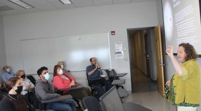 Syma Ebbin talks to her class at Avery Point on May 3 about microplastics found in Long Island Sound before the students gave presentations about waste handling practices in various towns in Connecticut.