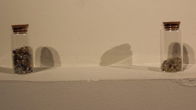 Ellenwood displayed several vials of nurdles she collected along with her photographs.