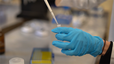 A researcher investigates PFAS in Wisconsin’s waters from a lab.