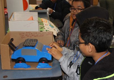 Students from PS 583 show a solar car model they created for one of their Long Island Sound Schools Network projects.