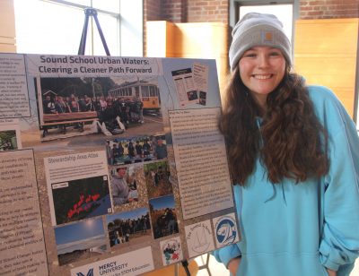 Sofia Roberts, a senior at The Sound School in New Haven, was one of the presenters of her group's poster.